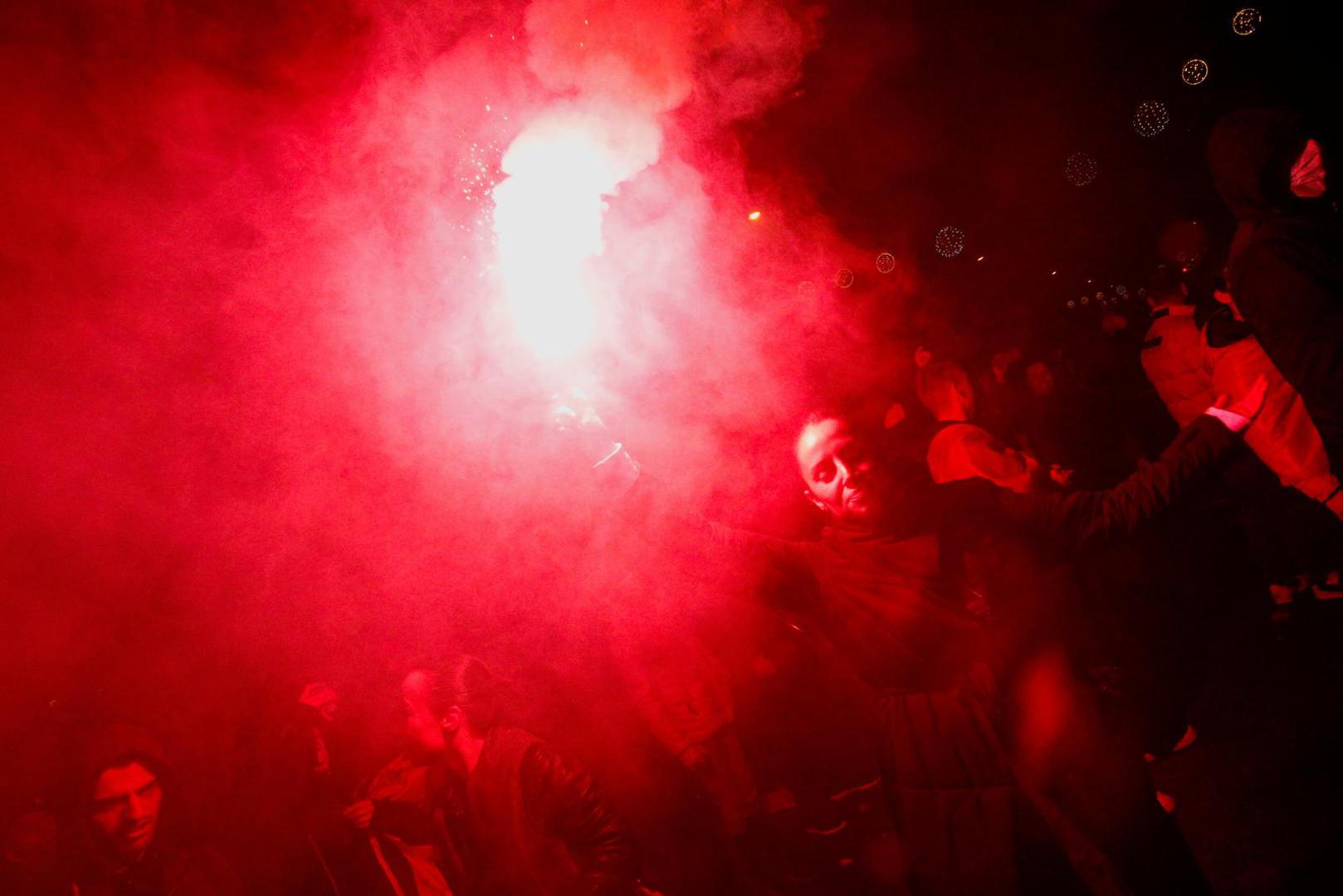 A protestor light a flare during a protest against the adoption of a law to limit presidential powers in Podgorica, Montenegro, December 12, 2022. REUTERS/Stevo Vasiljevic Photo: STEVO VASILJEVIC/REUTERS