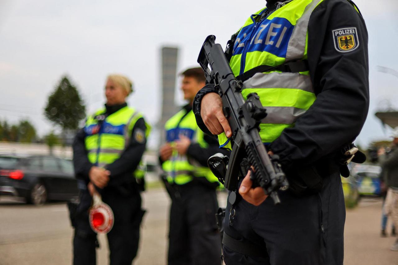 German police officers conduct random checks at a border with France, in Kehl