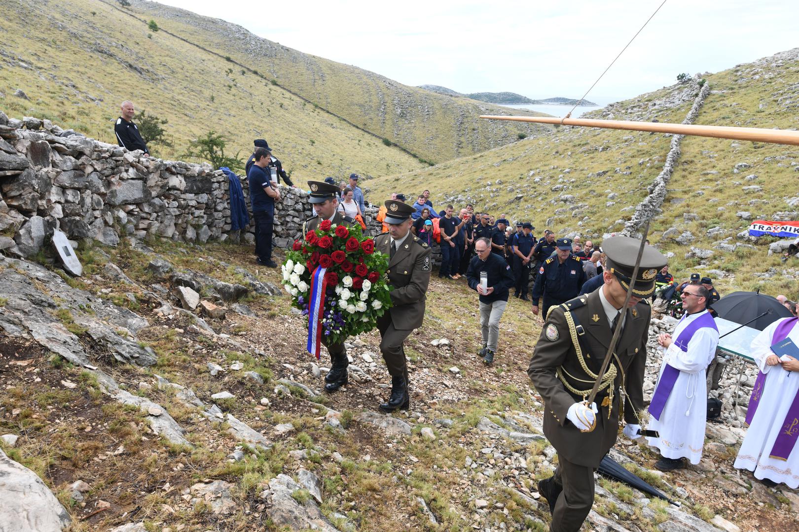 30.08.2023., Kornati - Na Kornatima obiljezena godisnjica tragedije u kojoj je poginulo 12 vatrogasaca. Photo: Hrvoje Jelavic/PIXSELL