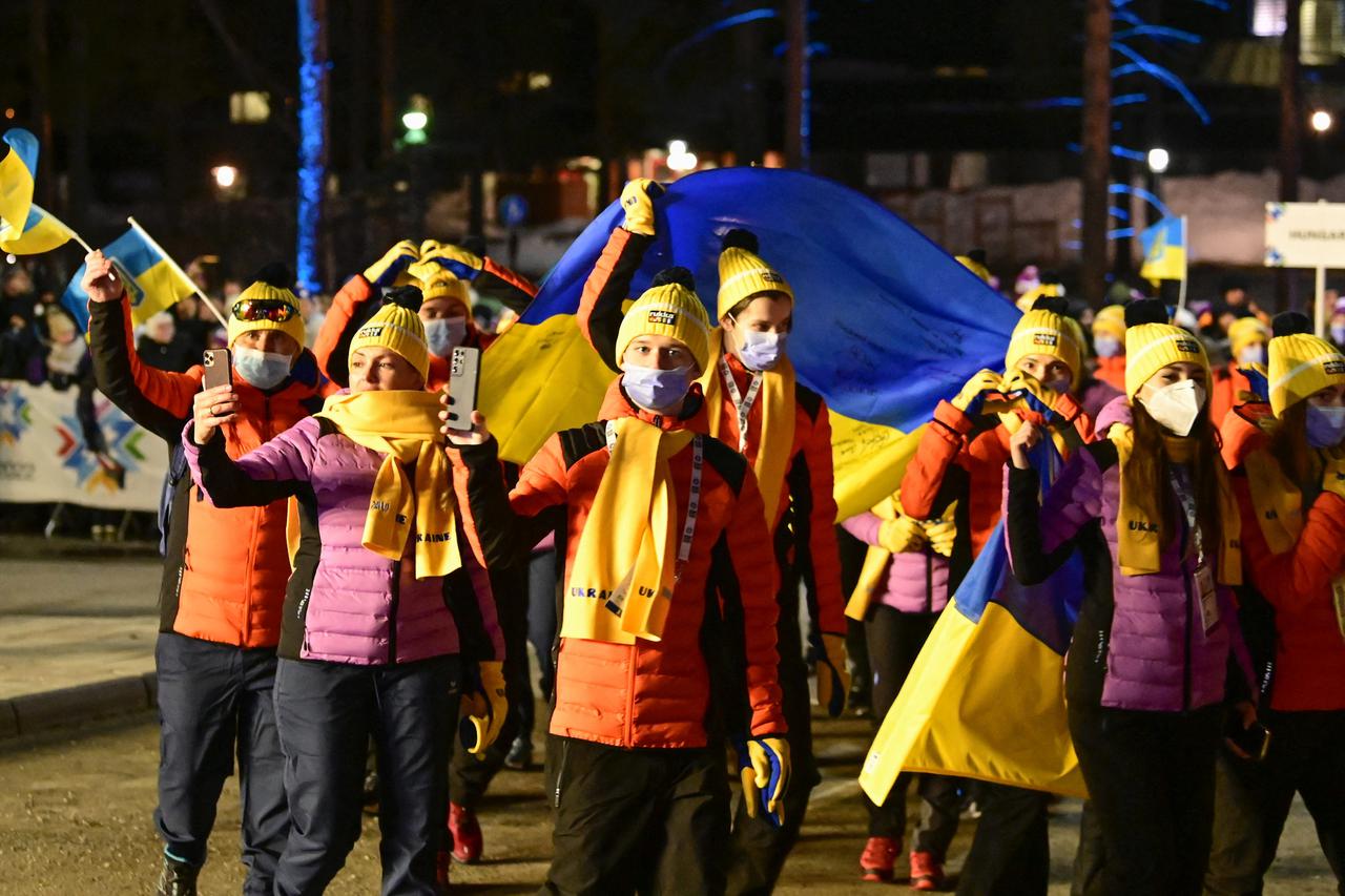 Athletes of the Team Ukraine march at the opening ceremonies of the Winter European Youth Olympic Festival (EYOF) in Vuokatti