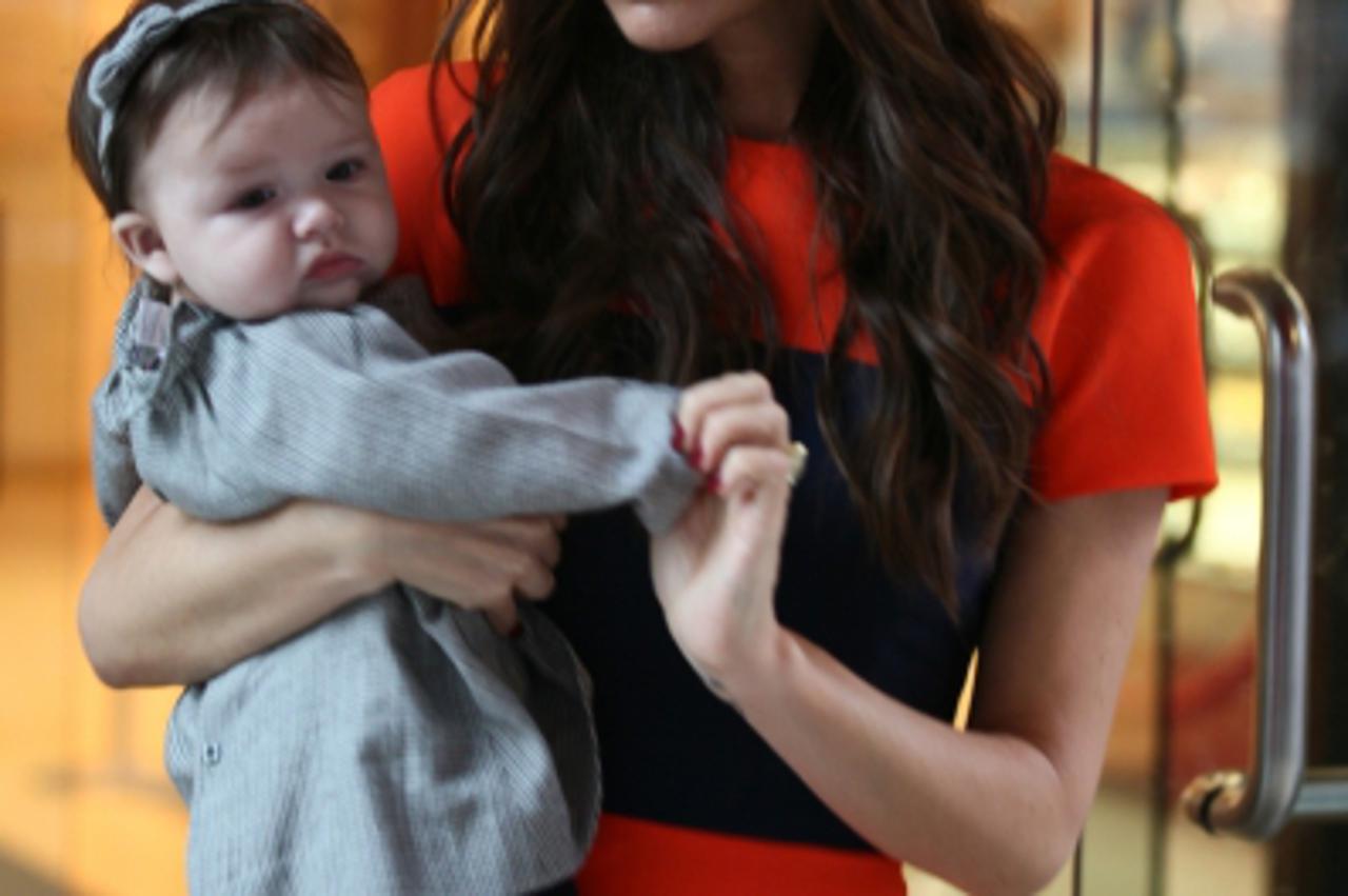 \'Victoria Beckham and baby Harper in NY on November 15, 2011. Photo: Press Association/Pixsell\'