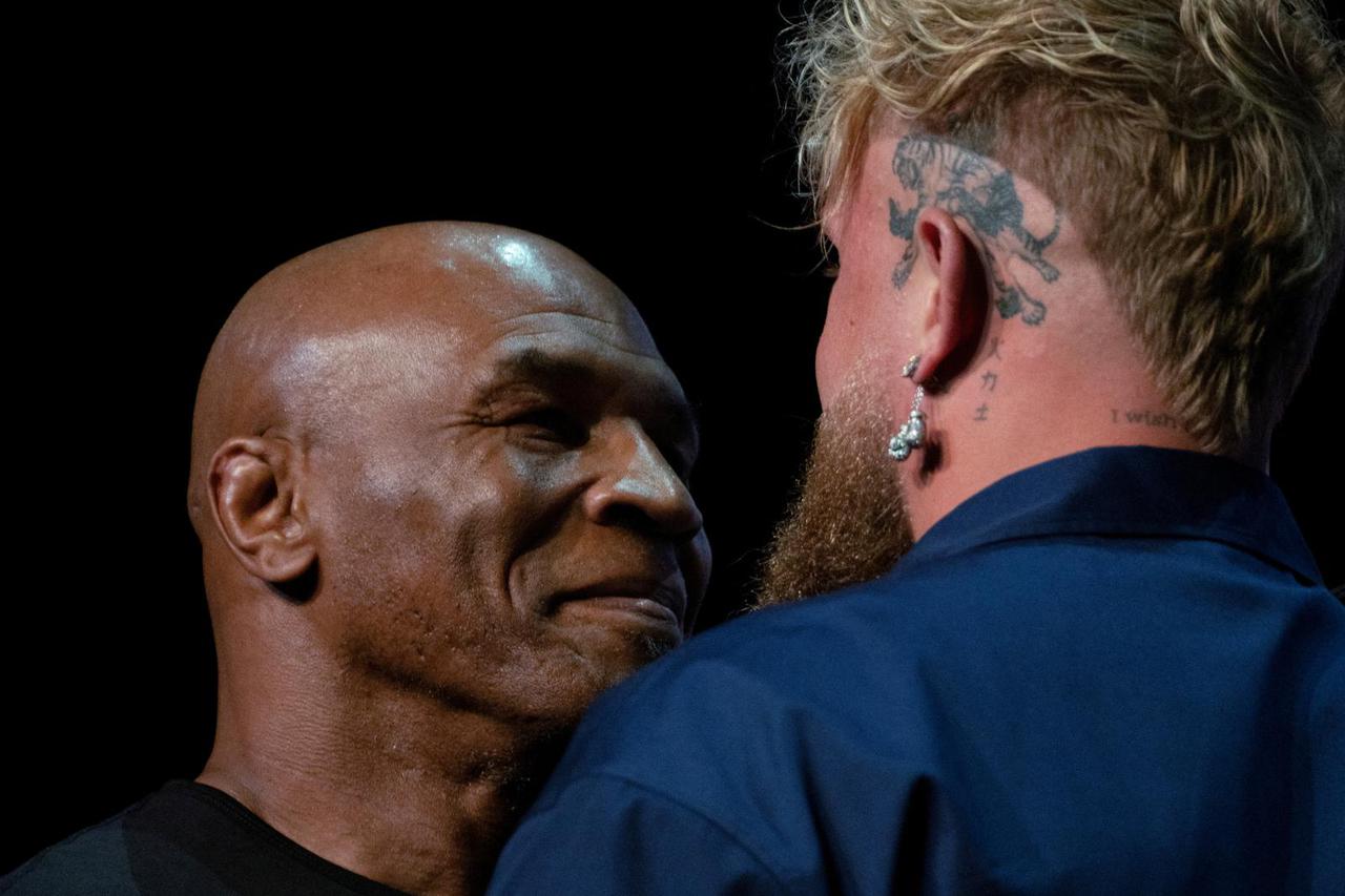 FILE PHOTO: Boxers Mike Tyson and Jake Paul attend a news conference in New York