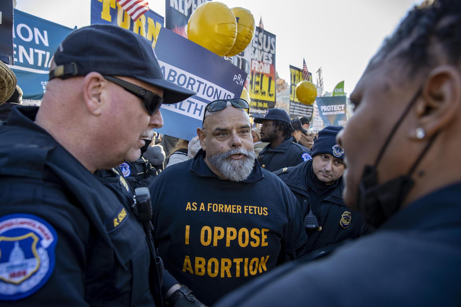 Protesters gather at the Supreme Court in Washington, D.C. on Wednesday, December 1, 2021. The court heard today the case Dobbs v. Jackson Women's Health Organization on the Mississippi law that bans nearly all abortions after 15 weeks. It is expected to be a direct challenge to the 1973 decision to  Roe v. Wade landmark case.    Photo by Tasos Katopodis/UPI . Photo via Newscom