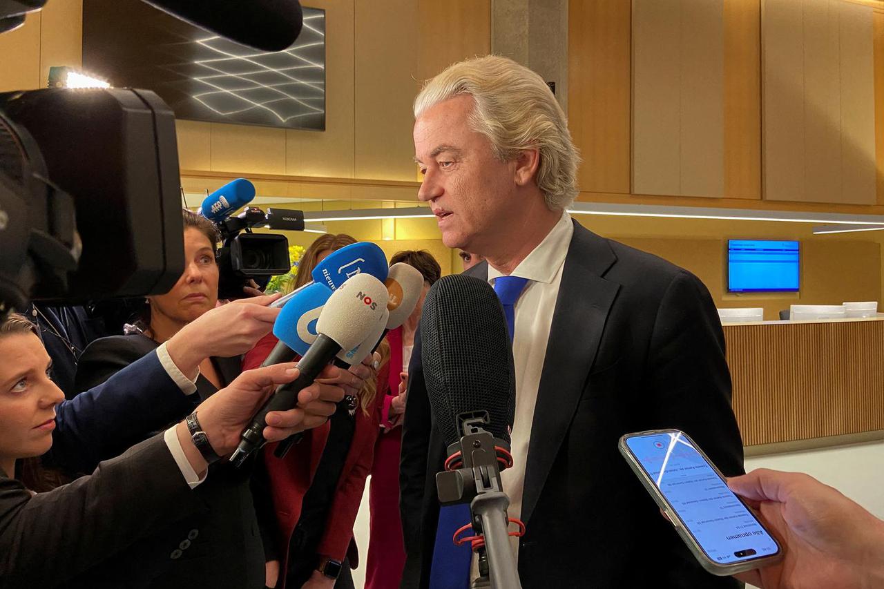 FILE PHOTO: Dutch far-right leader Geert Wilders speaks to media in The Hague