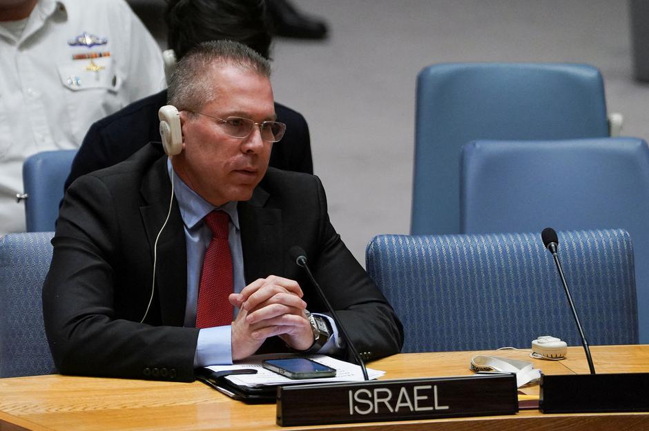 Members of the U.N. Security Council vote during a meeting on the conflict between Israel and Hamas