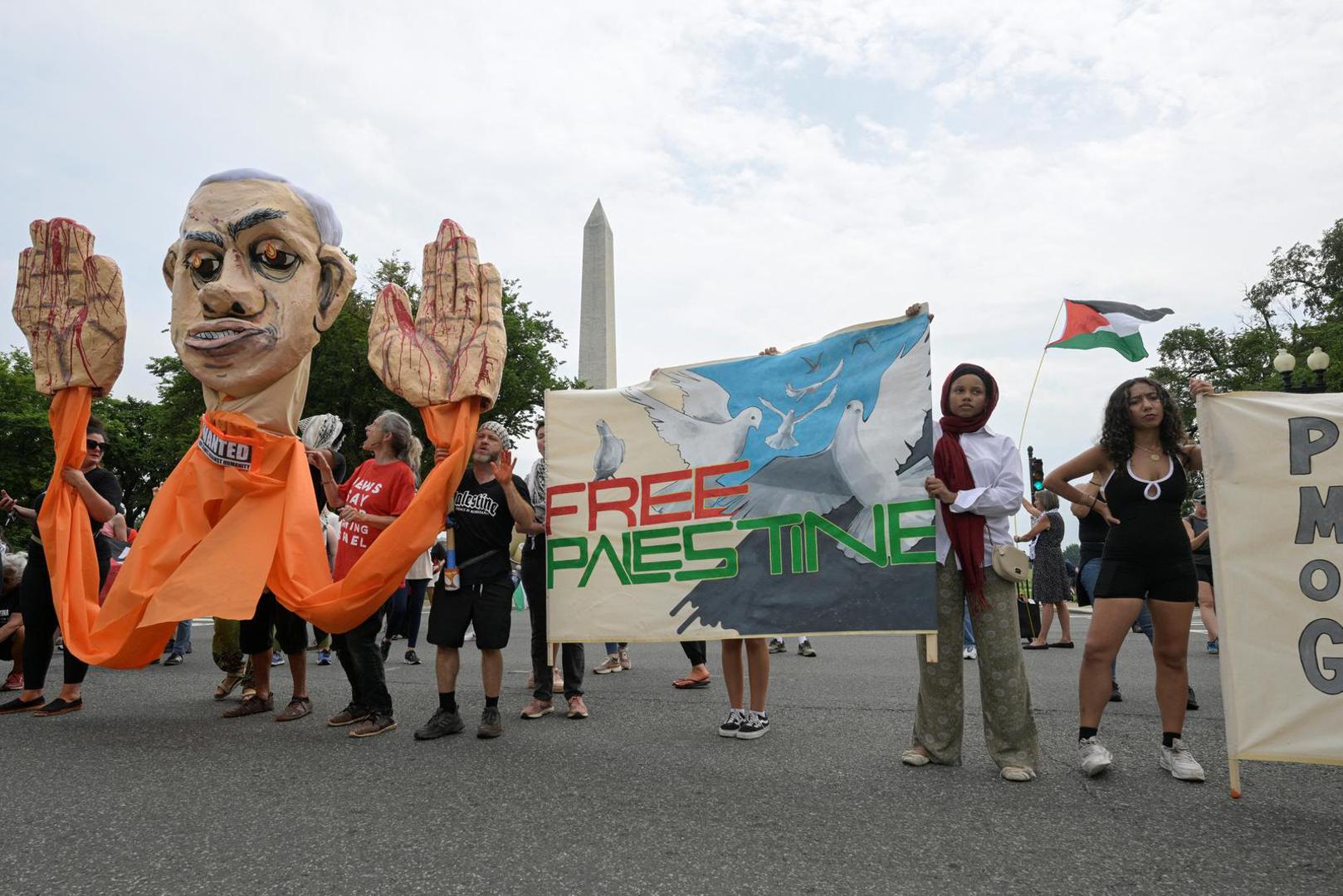 Demonstrators march during a pro-Palestinian protest on the day Israeli Prime Minister Benjamin Netanyahu is scheduled to meet with U.S. President Joe Biden and Vice President Kamala Harris near the White House in Washington, U.S., July 25, 2024. REUTERS/Craig Hudson Photo: CRAIG HUDSON/REUTERS