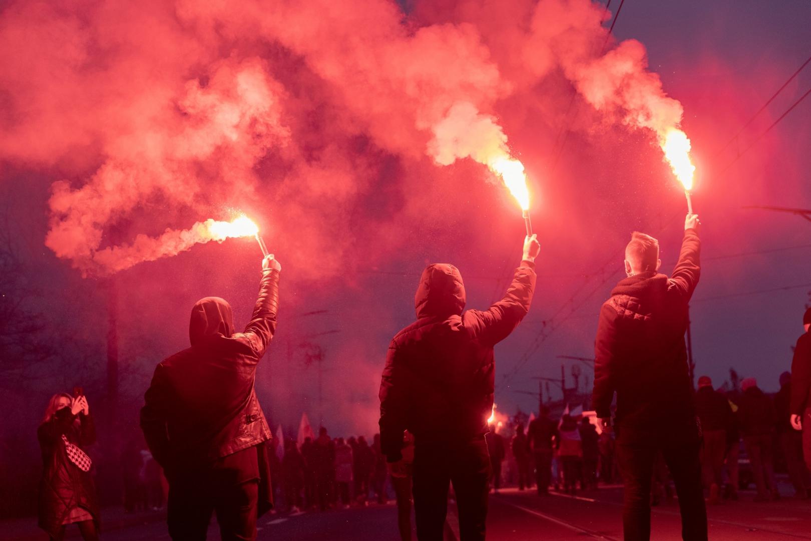 People mark the National Independence Day in Warsaw Demonstrators burn flares during a march marking the National Independence Day in Warsaw, Poland November 11, 2020. Jedrzej Nowicki/Agencja Gazeta/via REUTERS   ATTENTION EDITORS - THIS IMAGE WAS PROVIDED BY A THIRD PARTY. POLAND OUT. NO COMMERCIAL OR EDITORIAL SALES IN POLAND. JEDRZEJ NOWICKI