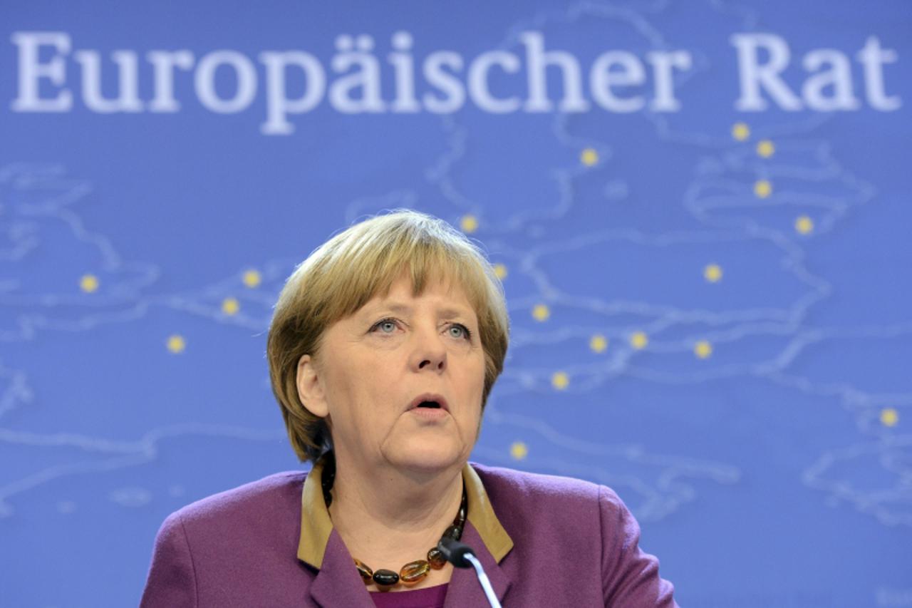 'Germany's Chancellor Angela Merkel holds a news conference at the end of a European Union leaders summit in Brussels March 15, 2013. European leaders met in Brussels for a second day of summit talks