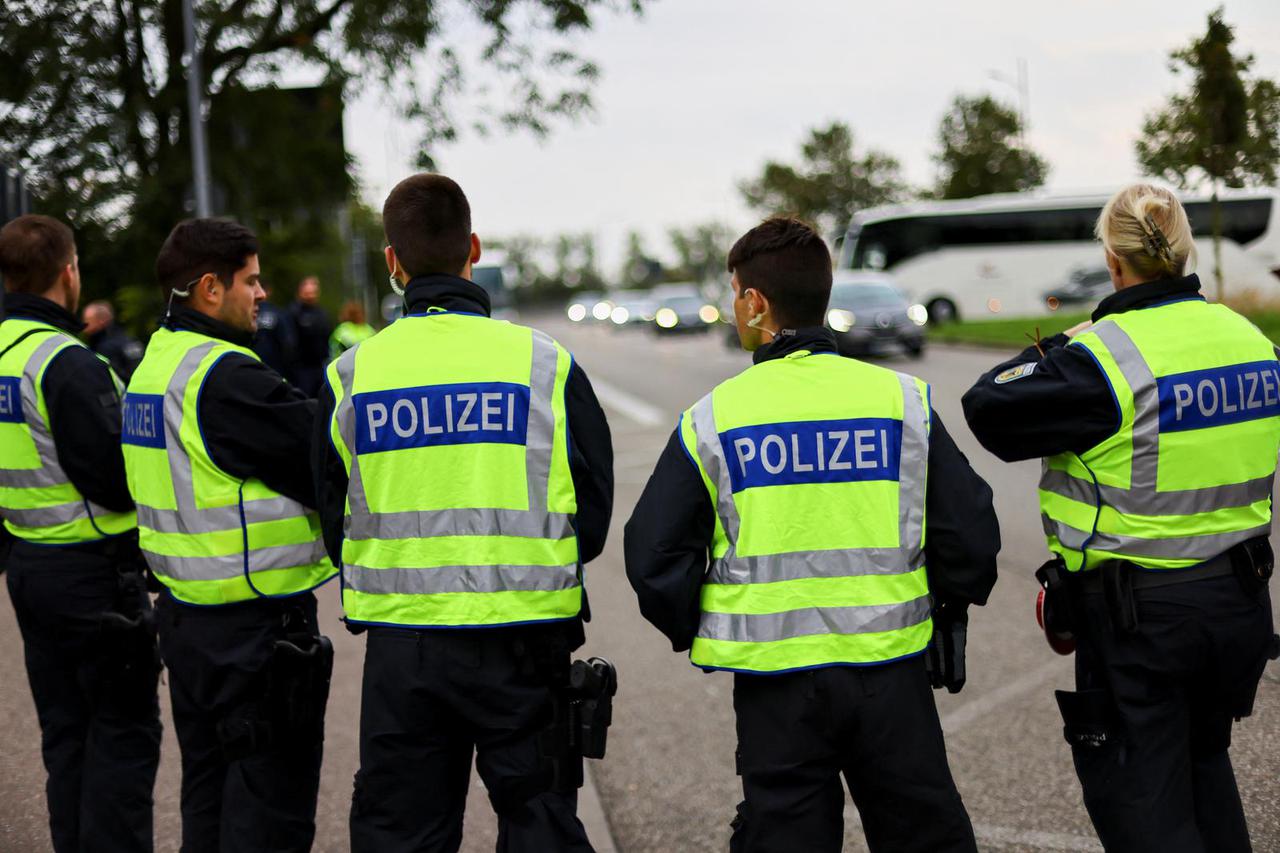 German police officers conduct random checks at a border with France, in Kehl