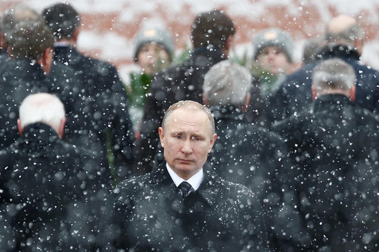 FILE PHOTO: Russian President Putin attends wreath laying ceremony to mark Defender of Fatherland Day at Tomb of Unknown Soldier by Kremlin wall in Moscow