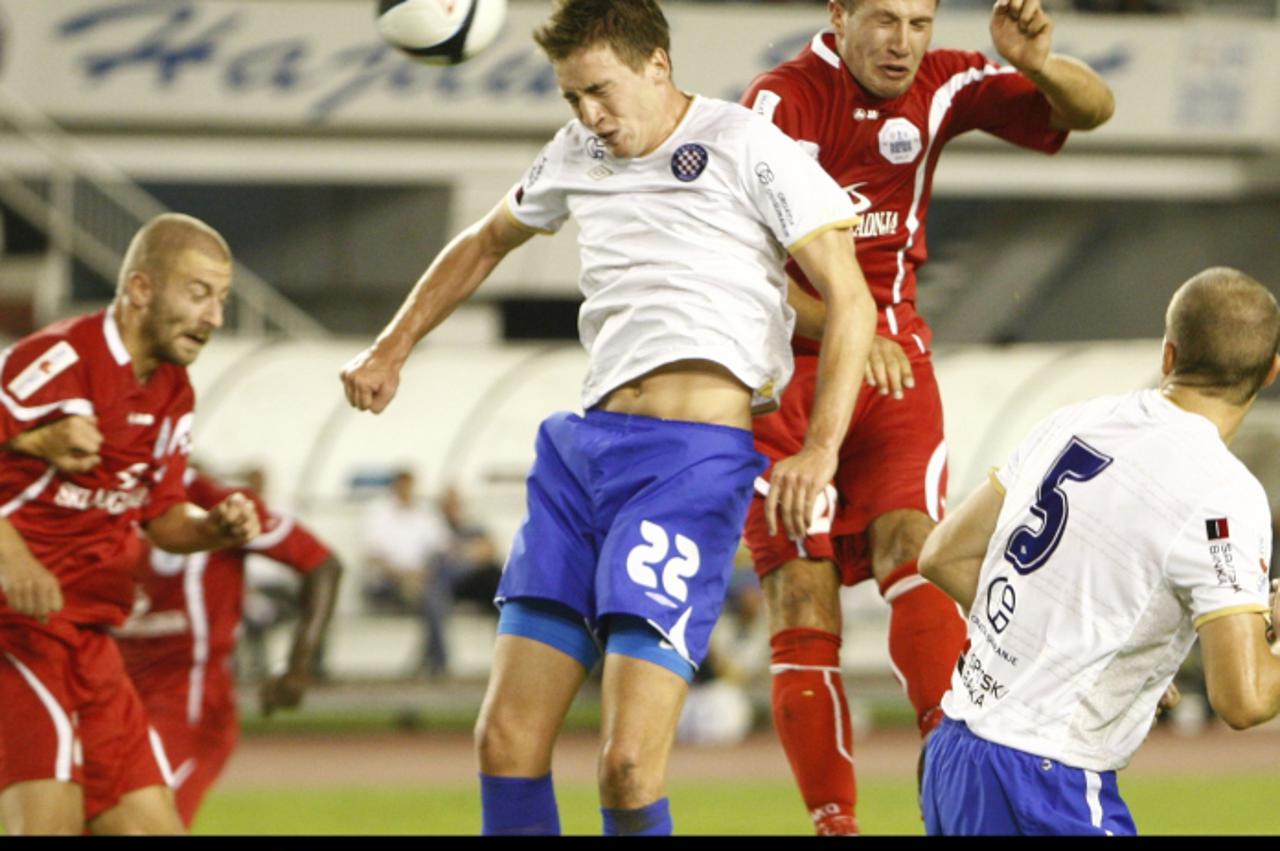 '29.07.2012., Stadion Poljud, Split  - MAXtv 1. HNL, 2. kolo, HNK Hajduk - RNK Split. Mario Maloca i Tomislav Radotic u skoku za loptu. Photo: Ivo Cagalj/PIXSELL'