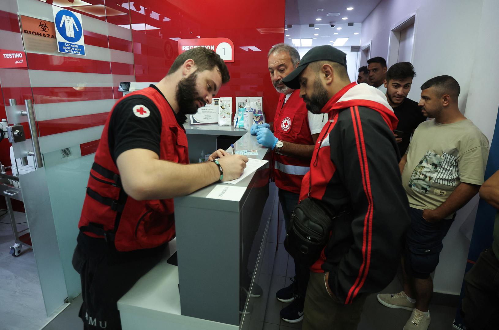 People register to donate blood as more than 1,000 people, including Hezbollah fighters and medics, were wounded on Tuesday when the pagers they use to communicate exploded across Lebanon, according to a security source, at Lebanese Red Cross center in Sidon, Lebanon September 17, 2024. REUTERS/Aziz Taher Photo: AZIZ TAHER/REUTERS