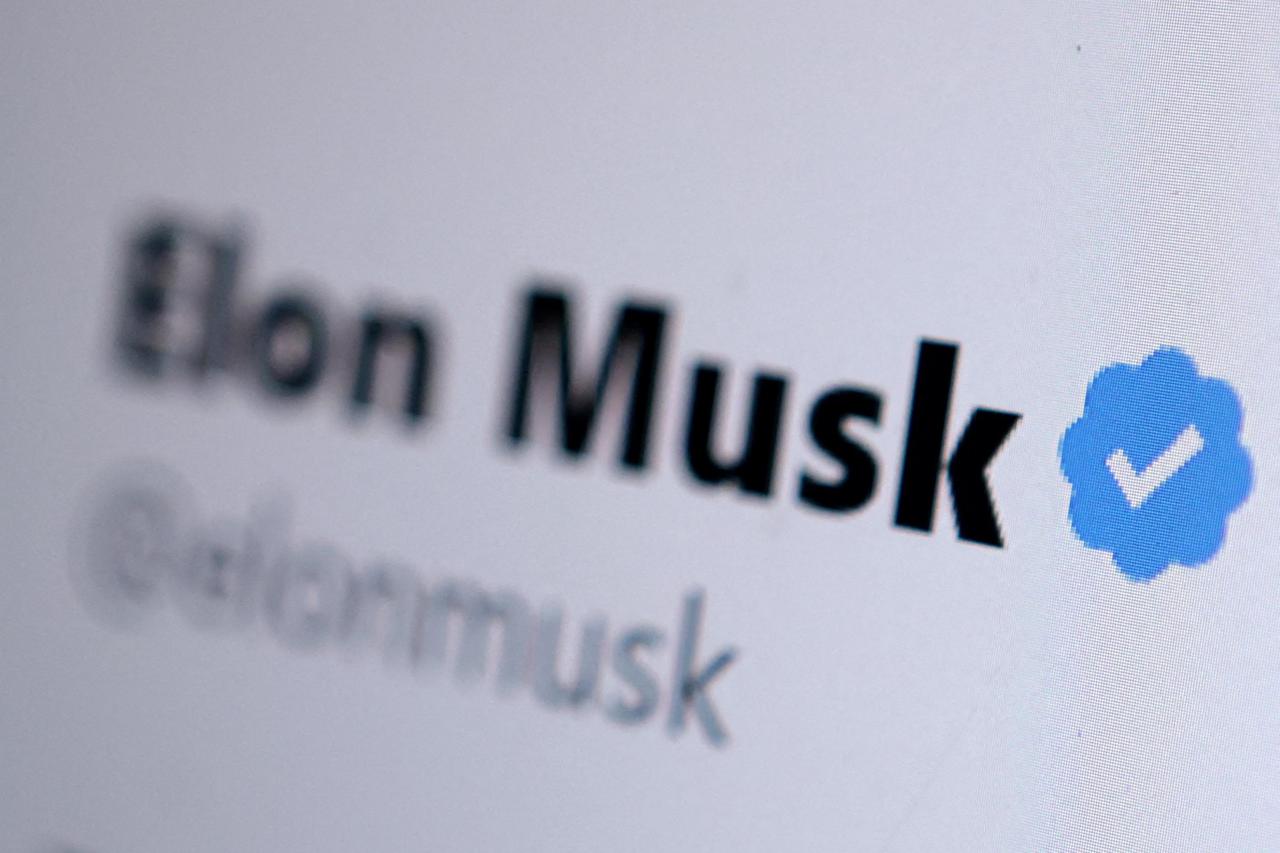 FILE PHOTO: Illustration shows Elon Musk Twitter account verification badge