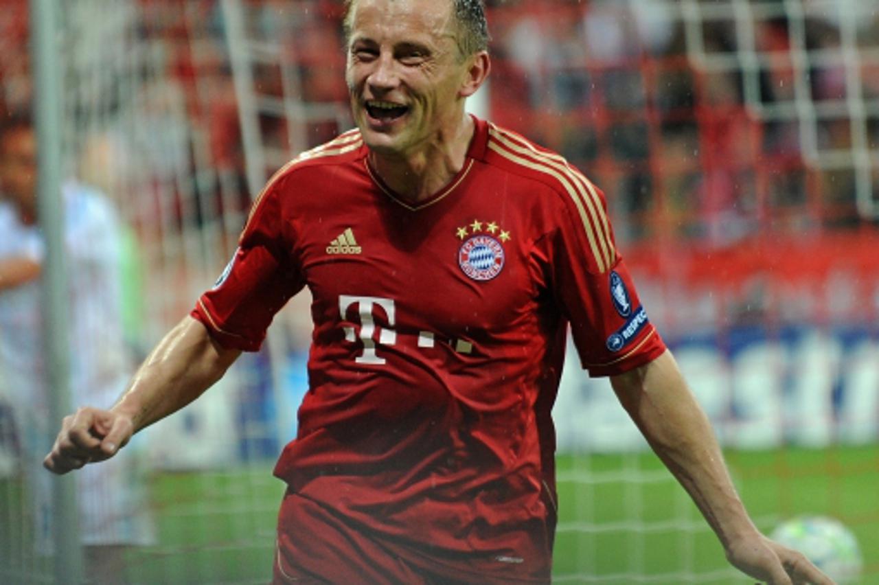 'Munich\'s Ivica Olic celebrates his 2:0 during the Champions League quarter final second leg soccer match between FC Bayern Munich and Olympique Marseille at the Allianz Arena in Munich, Germany, 03 