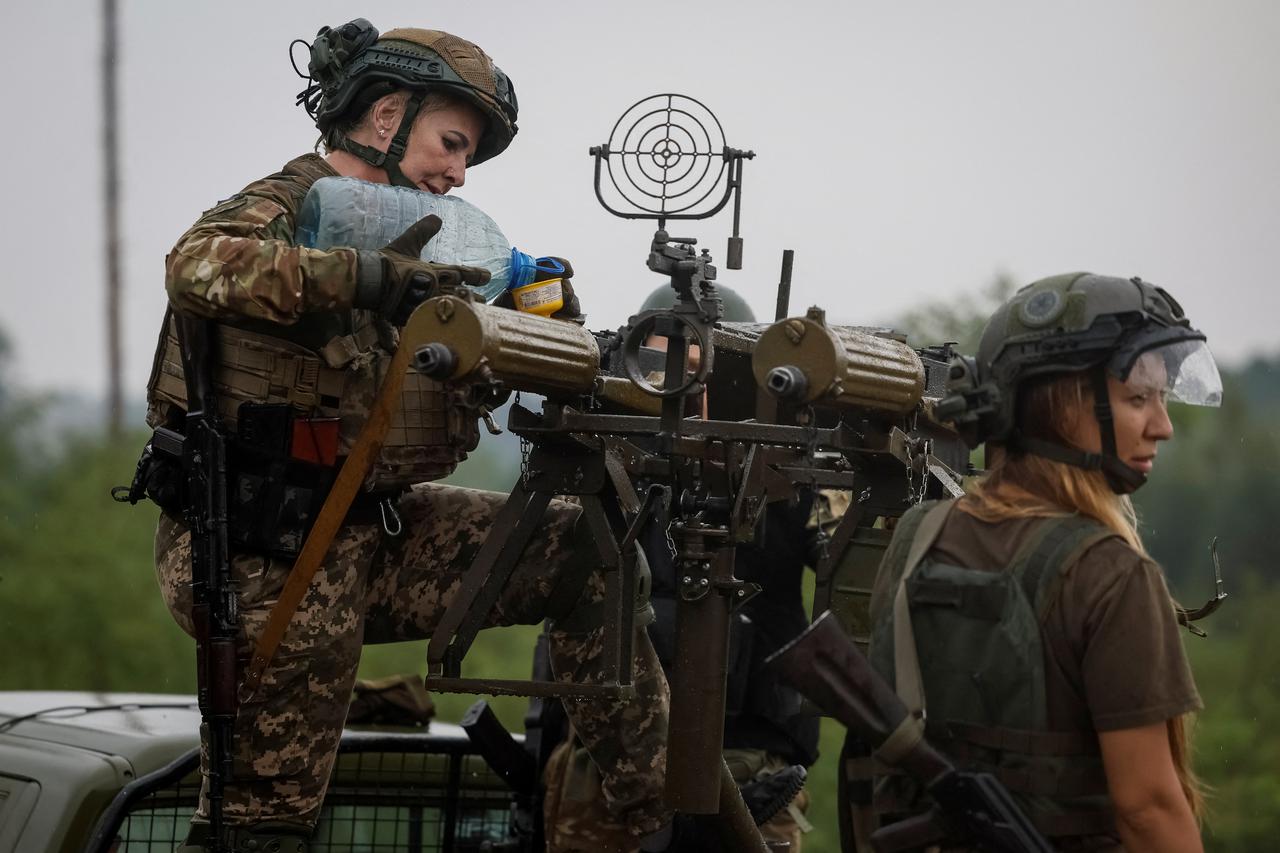 FILE PHOTO: Ukraine's President Zelenskiy visits Ukrainian troops in Kupiansk