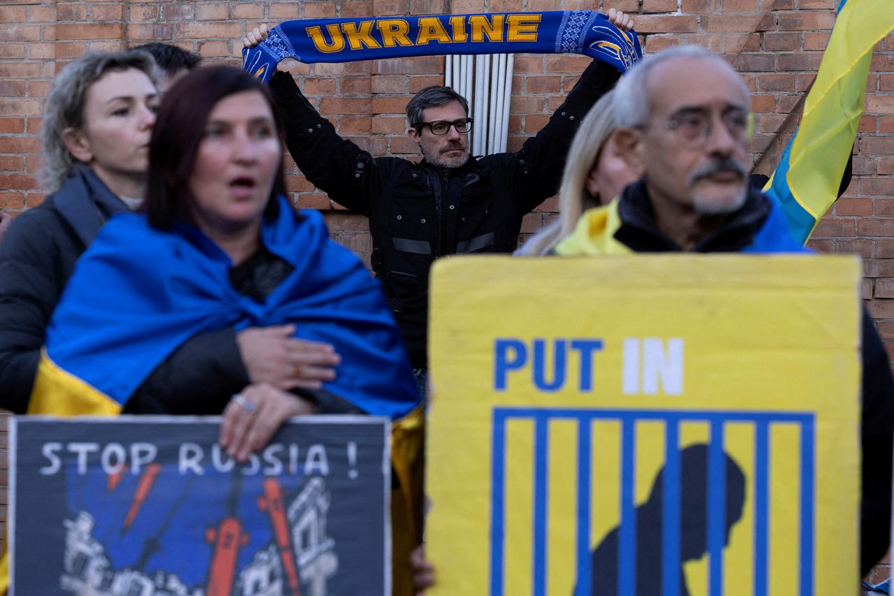 Protesters gather to participate in a demonstration marking the upcoming anniversary of 1,000 days since Russia's invasion of Ukraine, near the Russian Embassy in Rome