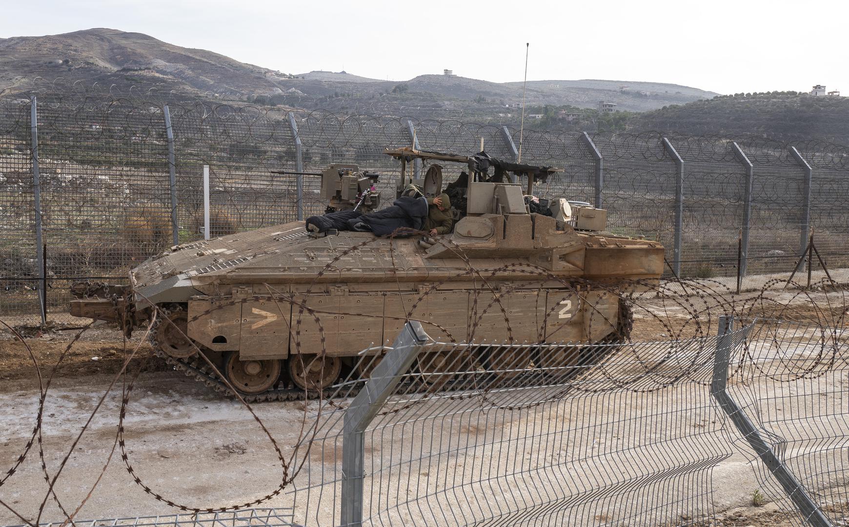 Israeli IDF soldiers asleep in their sleeping bags atop their Armoured Personnel Carrier (APC) parked along the border fence with Syria in the northern Israeli-controlled Golan Heights on December 10, 2024. Israel is extending is presence on the ground inside Syria following the Syrian rebel takeover of most of the country in the past days. Photo by Jim Hollander/UPI Photo via Newscom Photo: JIM HOLLANDER/NEWSCOM