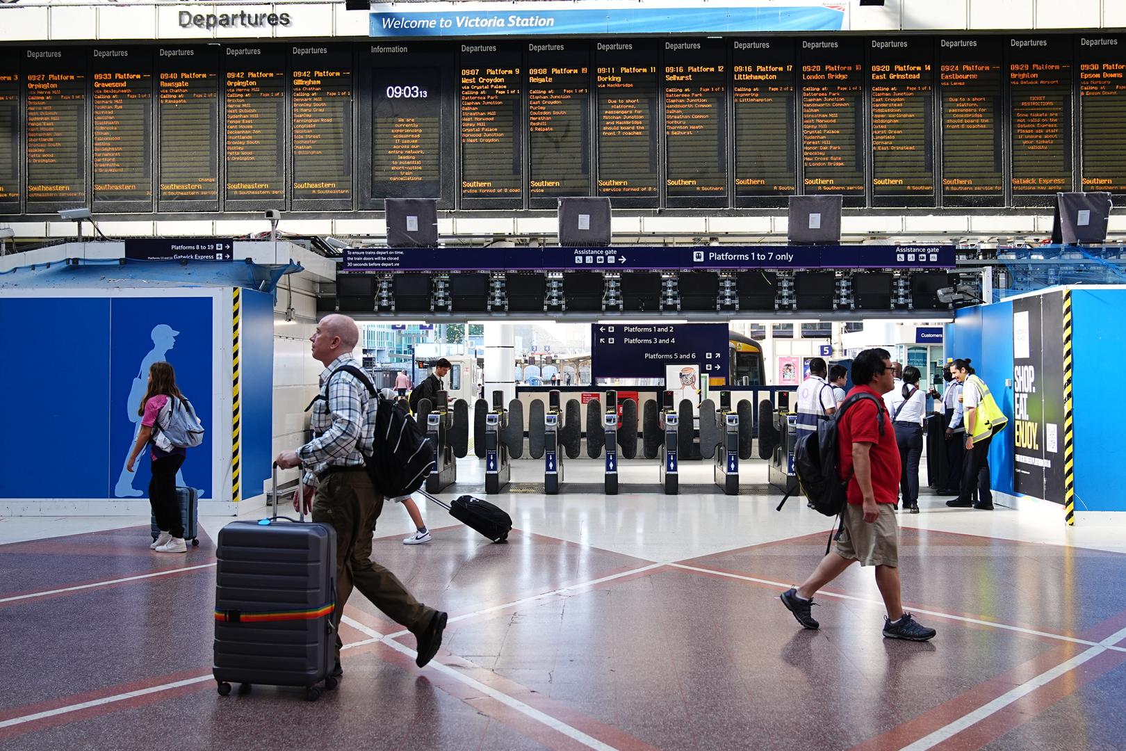 Passengers at Victoria train station, London, amid reports of widespread IT outages affecting airlines, broadcasters and banks. Picture date: Friday July 19, 2024. Photo: Aaron Chown/PRESS ASSOCIATION