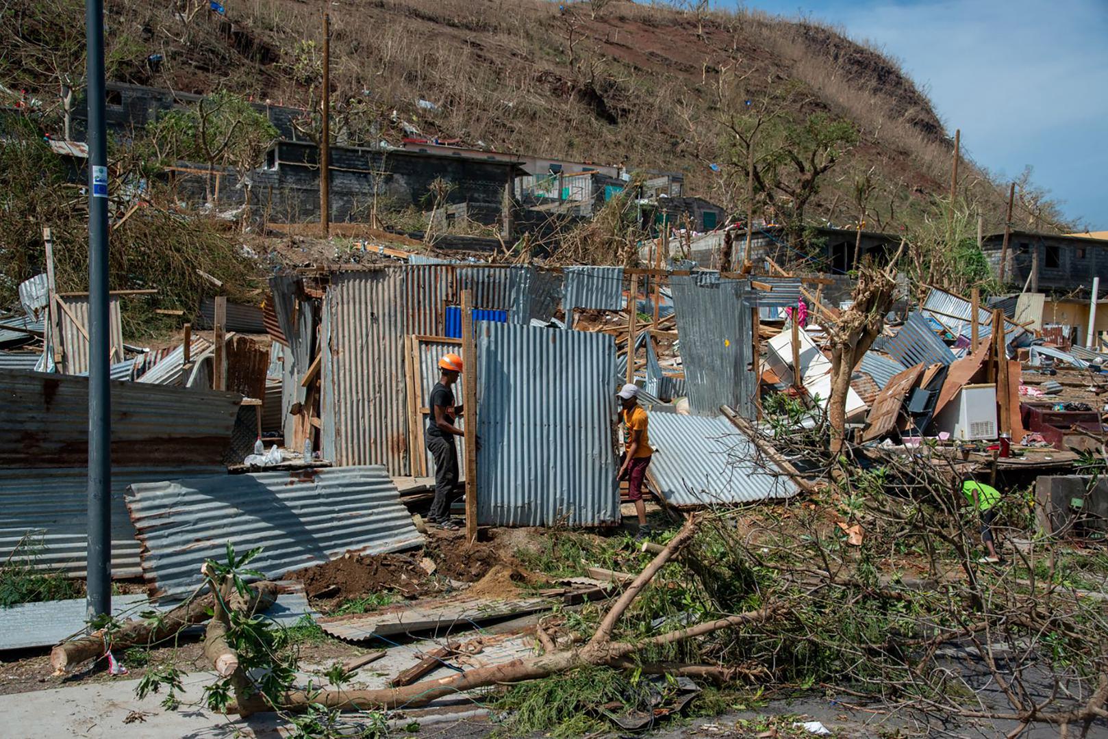 A scene of devastation after the cyclone Chido hit France’s Indian Ocean territory of Mayotte, on December 14, 2024 in the Bandrajou Kaweni district of the capital Mamoudzou. At least several hundred people are feared to have been killed after the worst cyclone in almost a century ripped through the French Indian Ocean territory of Mayotte on Saturday, uprooting trees, tearing houses apart and pounding the impoverished archipelago’s already weak infrastructure. Rescuers have been dispatched to the islands, which lie between the coast of Mozambique and Madagascar, but their efforts are likely to be hindered by damage to airports and electricity distribution in an area where clean drinking water is subject to chronic shortages. Photo by David Lemor/ABACAPRESS.COM Photo: Lemor David/ABACA/ABACA