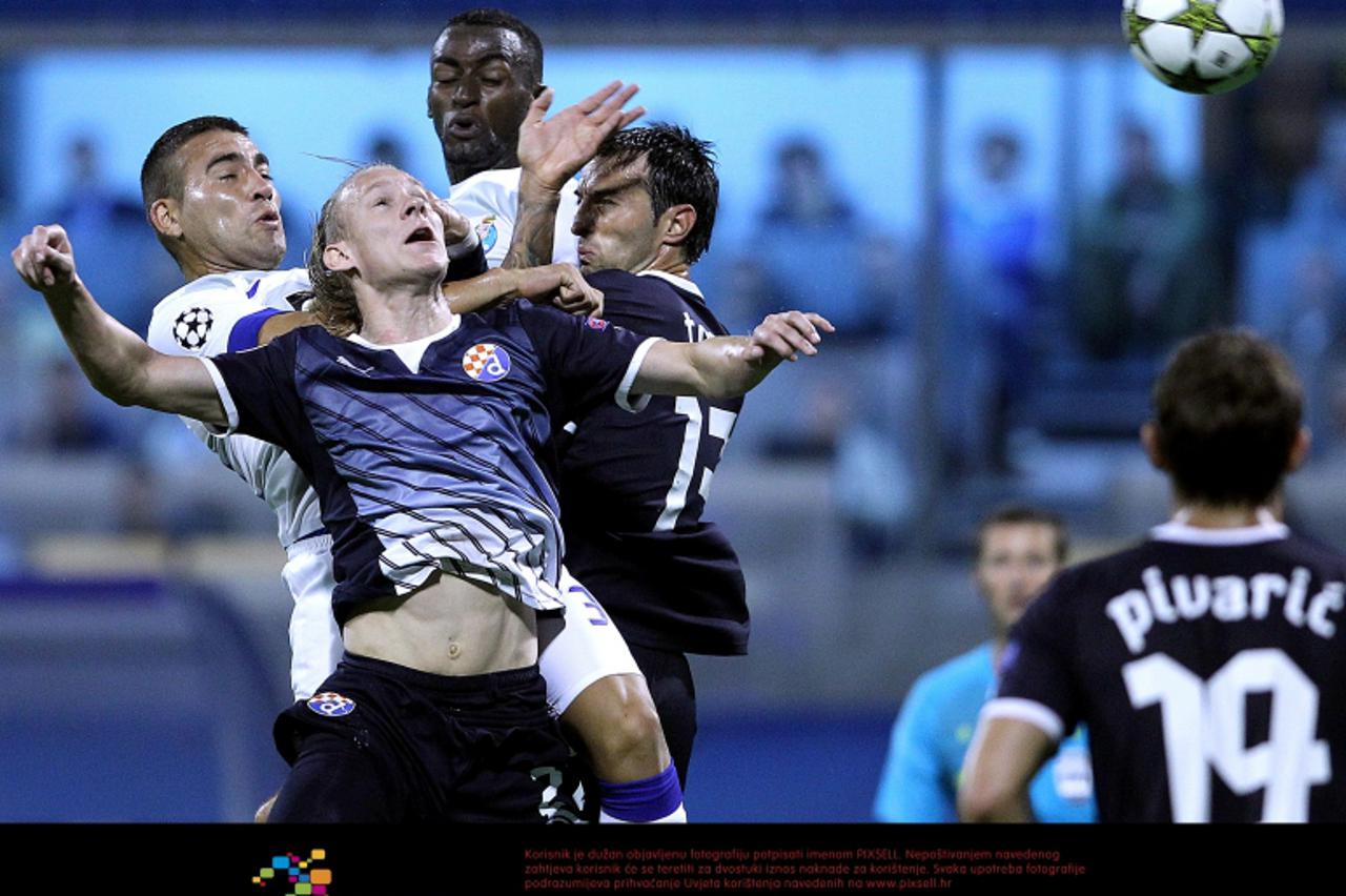 '18.09.2012., Zagreb,  Stadion Maksimir - Nogometna utakmica 1. kola UEFA Lige prvaka. GNK Dinamo - FC Porto.  Domagoj Vida, Nicolas Otamendi, Tonel, Jackson Martinez.  Photo: Goran Stanzl/PIXSELL'