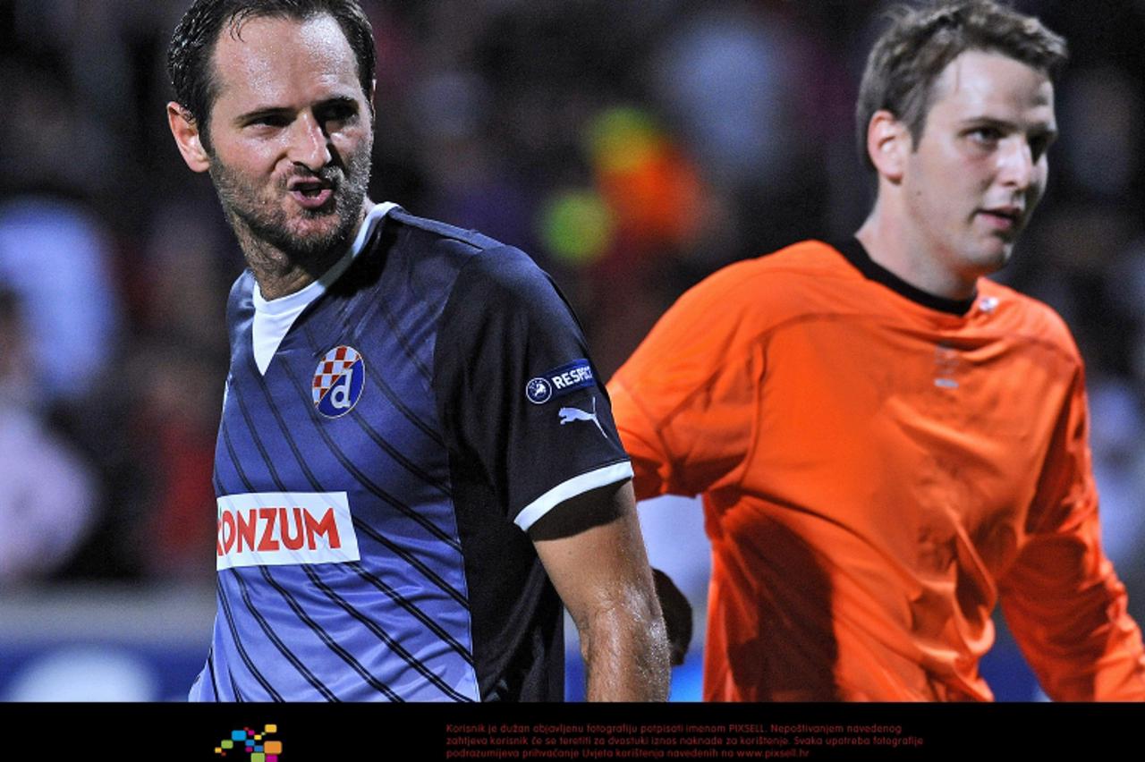 '27.09.2011., Stadion Gerland, Lyon, Francuska - UEFA Liga prvaka, skupina D, 2. kolo, Lyon - Dinamo Zagreb. Josip Simunic(4) ljut na navijace Lyona, Ivan Kelava(30).  Photo: Goran Stanzl/PIXSELL'