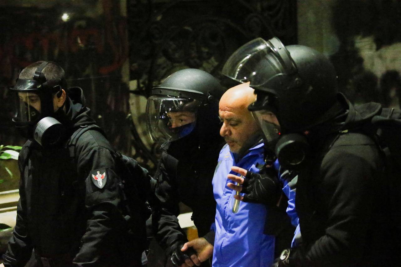 Georgian opposition supporters protest against government's EU application delay, in Tbilisi