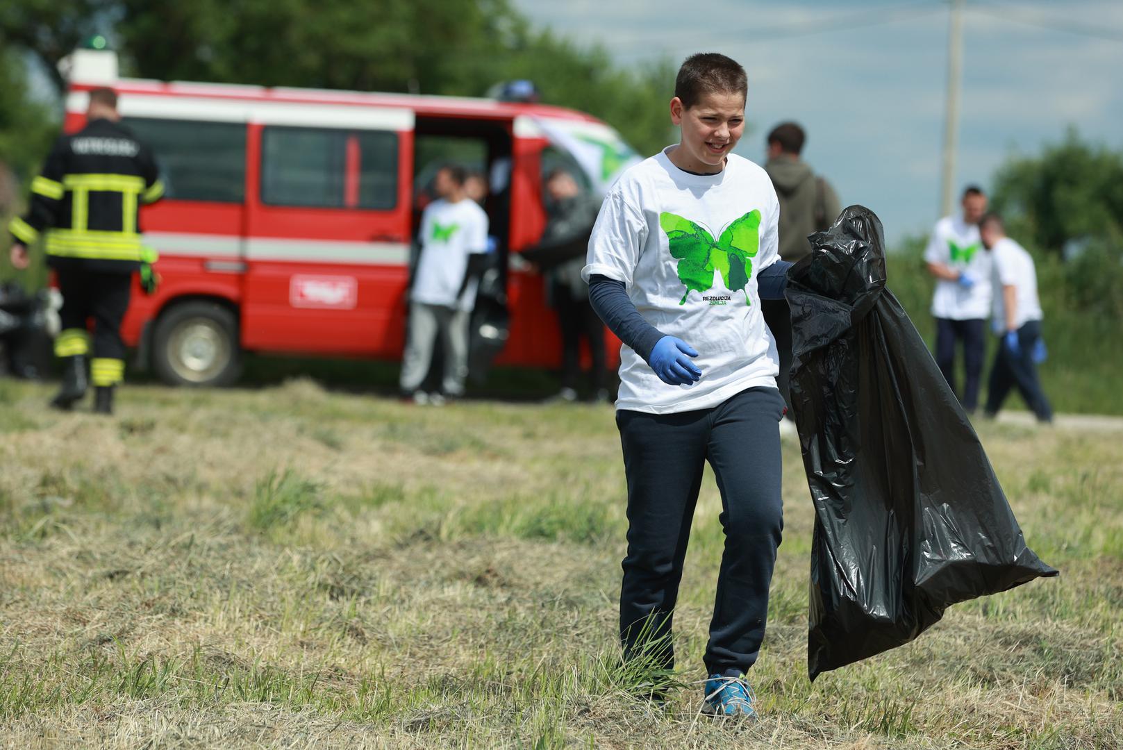 PRI KORISTENJU FOTOTGRAFIJE ZASTITITI IDENTITET DJETETA! (PREKRITI OCI). 21.04.2024., Bosnjaci - Rezolucija Zemlja akcija ciscenja Savjet mladih Opcine Bosnjaci. Photo: Davor Javorovic/PIXSELL