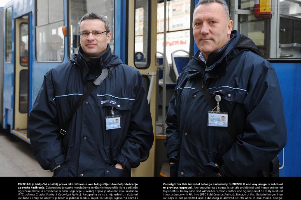 '10.01.2013., Zagreb -  Reportaza o kontrolorima ZET-a. Kontrolori Zeljko Marinovic i Davor Guja pregledavali su karte putnika u tramvajima.  Photo: Davor Visnjic/PIXSELL'