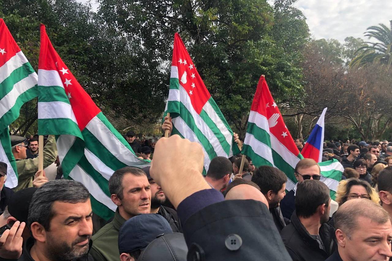 Protesters rally outside the parliament building in the capital of Georgia's breakaway region of Abkhazia