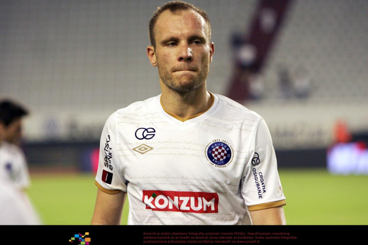 \'07.08.2011., Split - Nogometna utakmica 3. kola 1. HNL, NK Hajduk - NK Rijeka.  Hajdukovi igraci napustaju teren bez velikog veselja. Srdjan Andric.Photo: Ivo Cagalj/PIXSELL\'