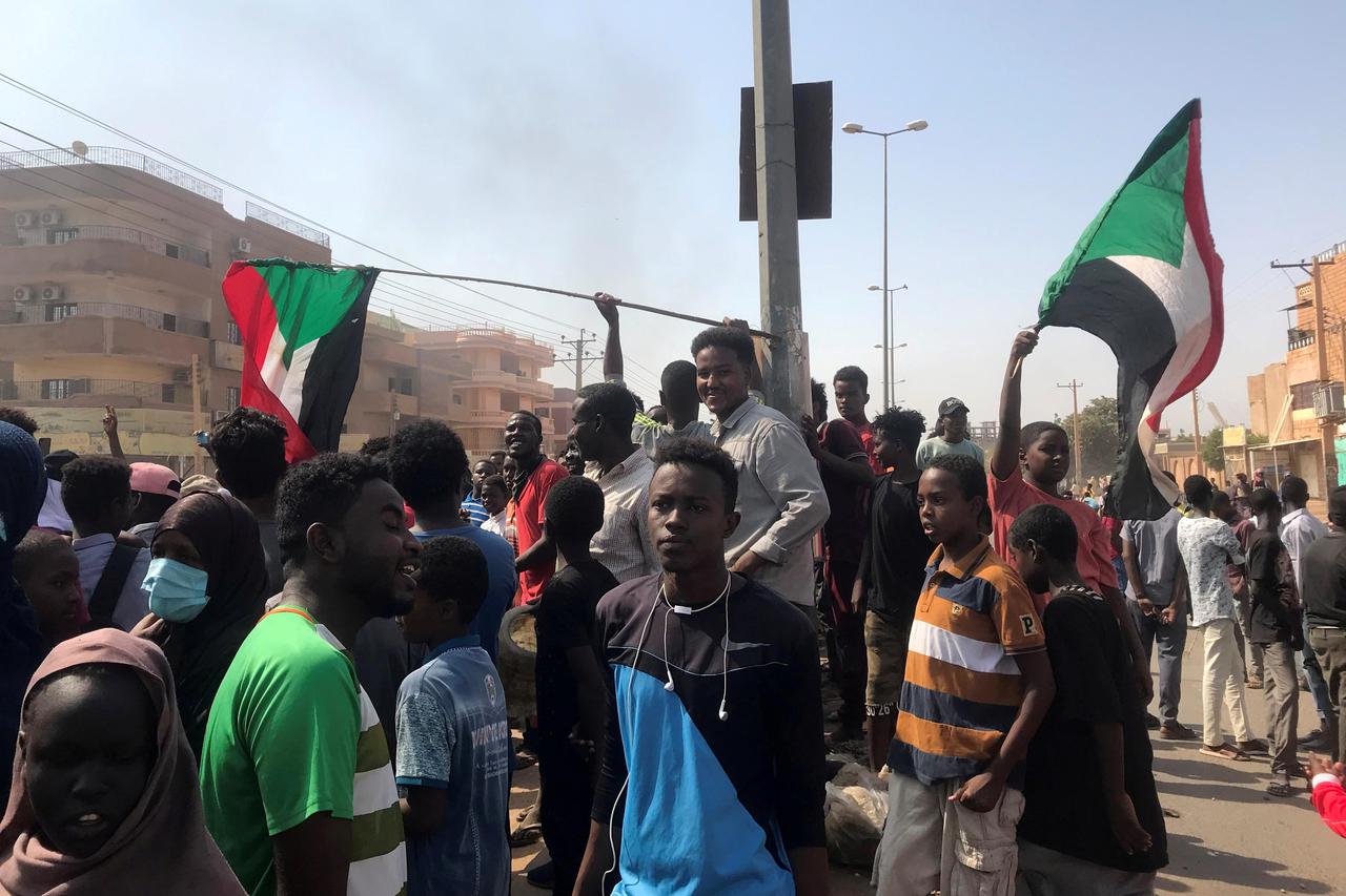 Protesters block a road in Khartoum