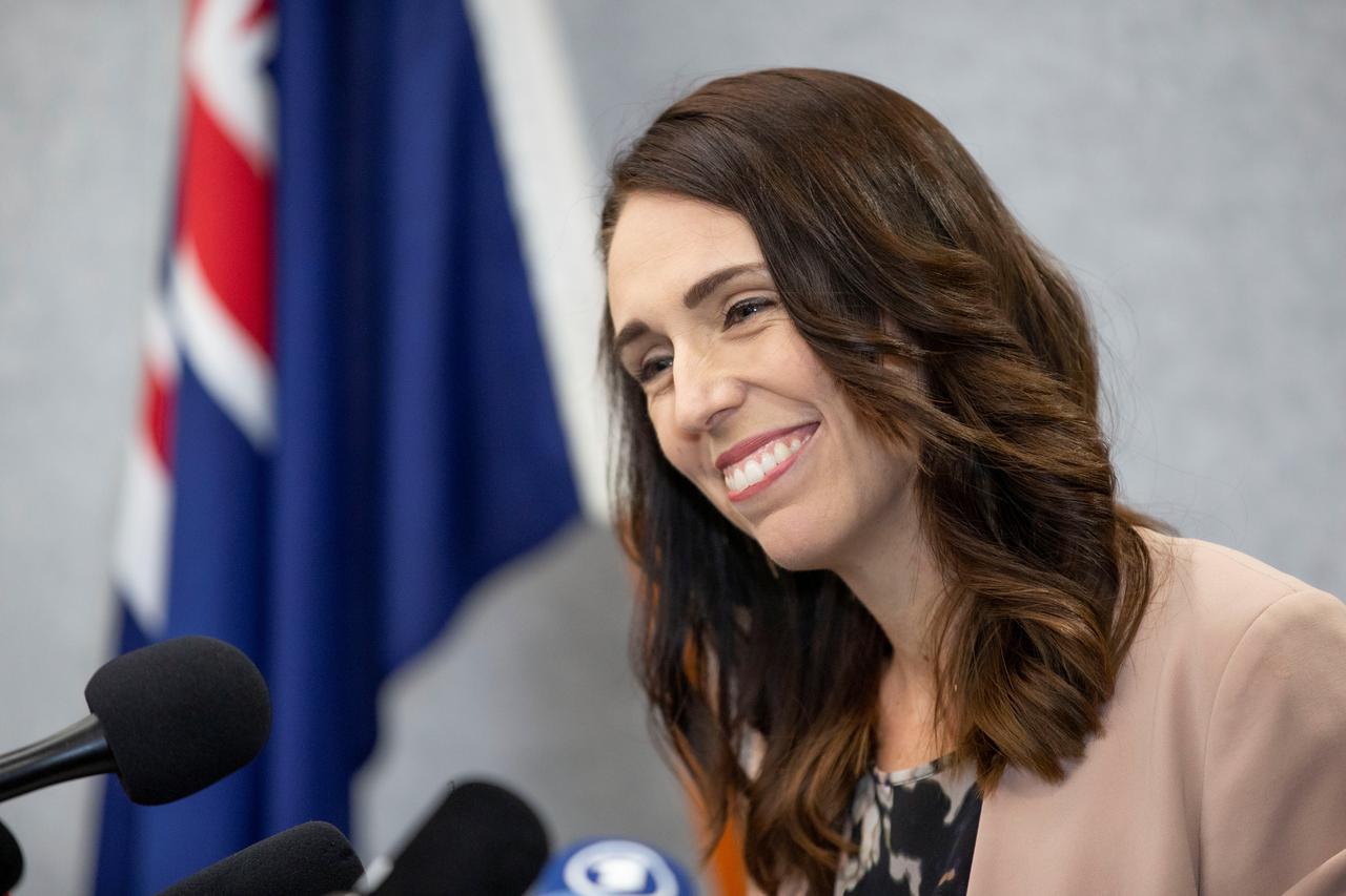 New Zealand Prime Minister Jacinda Ardern smiles during a news conference prior to the anniversary of the mosque attacks that took place the prior year in Christchurch