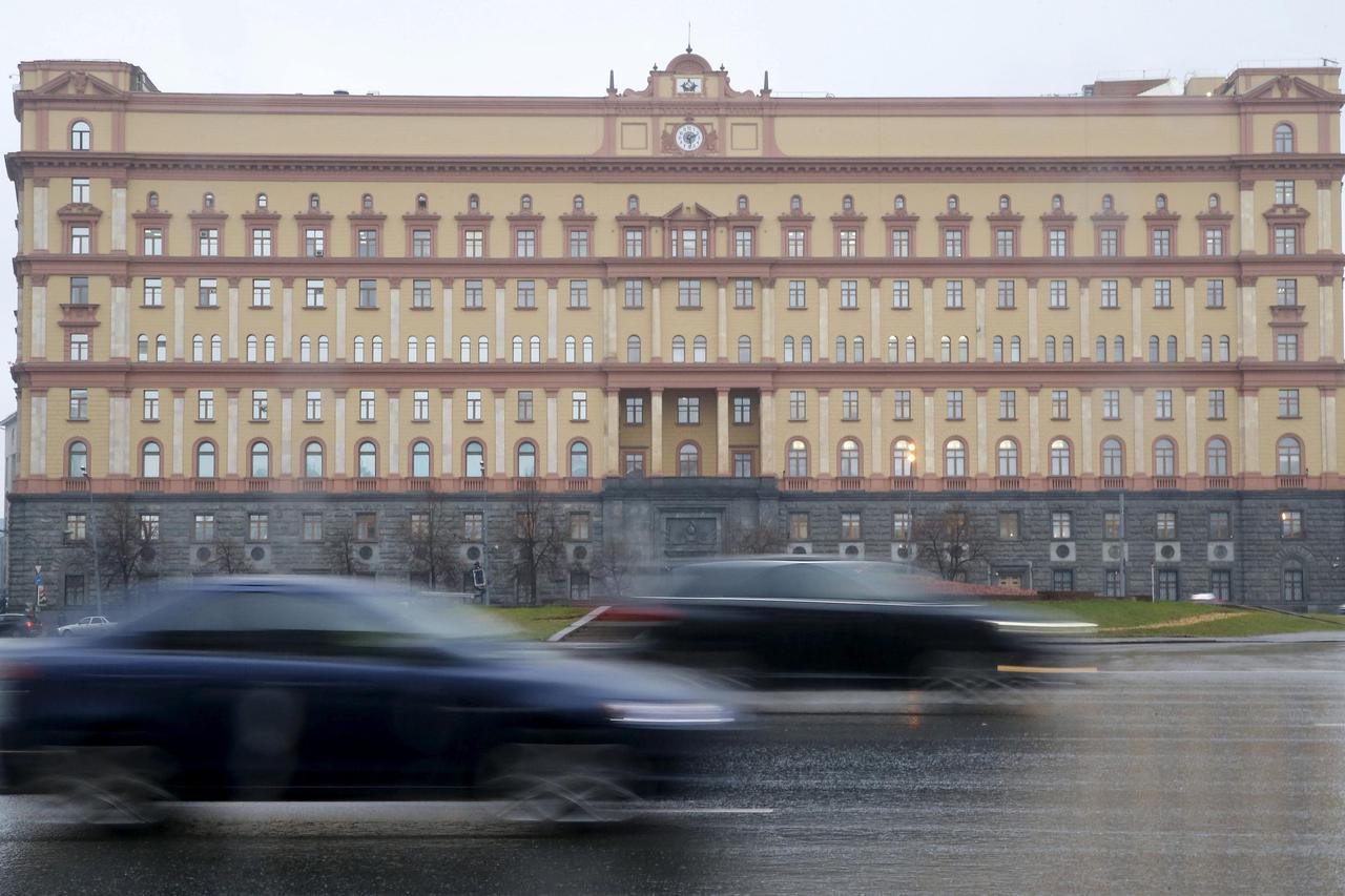 FILE PHOTO: Cars drive past the headquarters of the Federal Security Service (FSB) in central Moscow