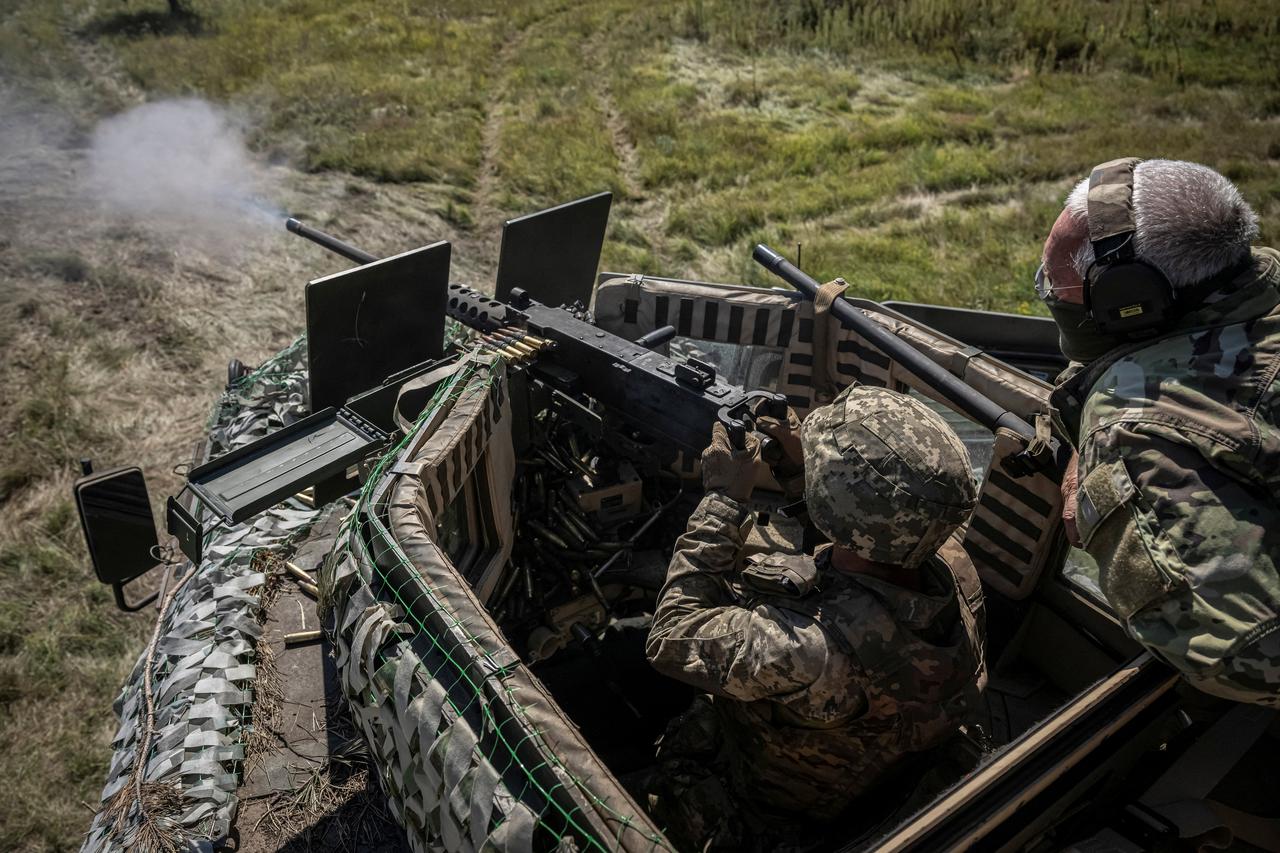 Ukrainian servicemen take part in an exercise in an undisclosed location in Ukraine