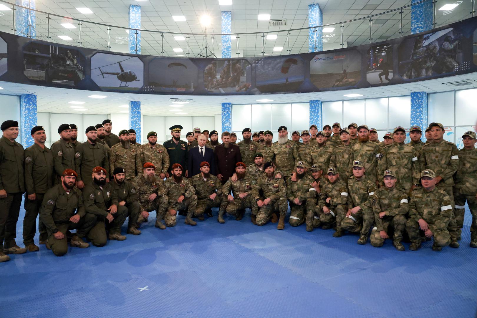 Russia's President Vladimir Putin and head of the Chechen Republic Ramzan Kadyrov pose for a picture with service members as they visit the Russian Special Forces University in Gudermes, Russia August 20, 2024. Sputnik/Vyacheslav Prokofyev/Pool via REUTERS ATTENTION EDITORS - THIS IMAGE WAS PROVIDED BY A THIRD PARTY. Photo: VYACHESLAV PROKOFYEV/REUTERS