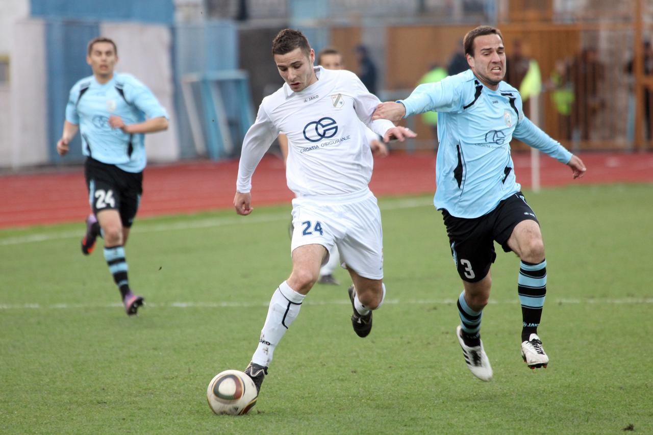 19.03.2011., Rijeka - Nogometna utakmica 22. kola Prve HNL izmedju NK Rijeka i NK Cibalia. Andro Svrljuga, Tomislav Culjak. Photo: 