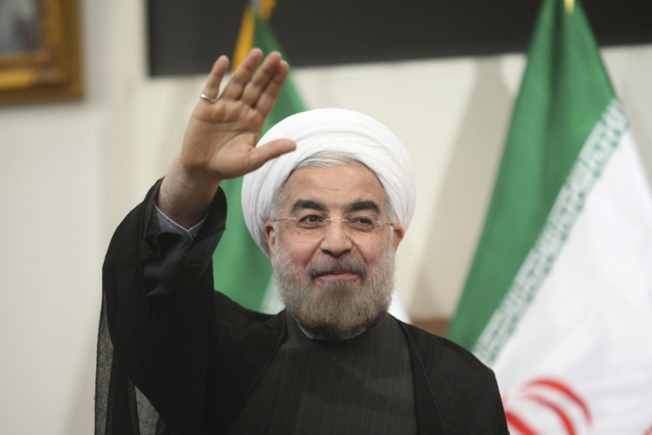 'Iranian President-elect Hassan Rouhani gestures to the media during a news conference in Tehran in this June 17, 2013 file photo. Saudi Arabia\'s King Abdullah\'s disdain for Iran leaps from U.S. emb