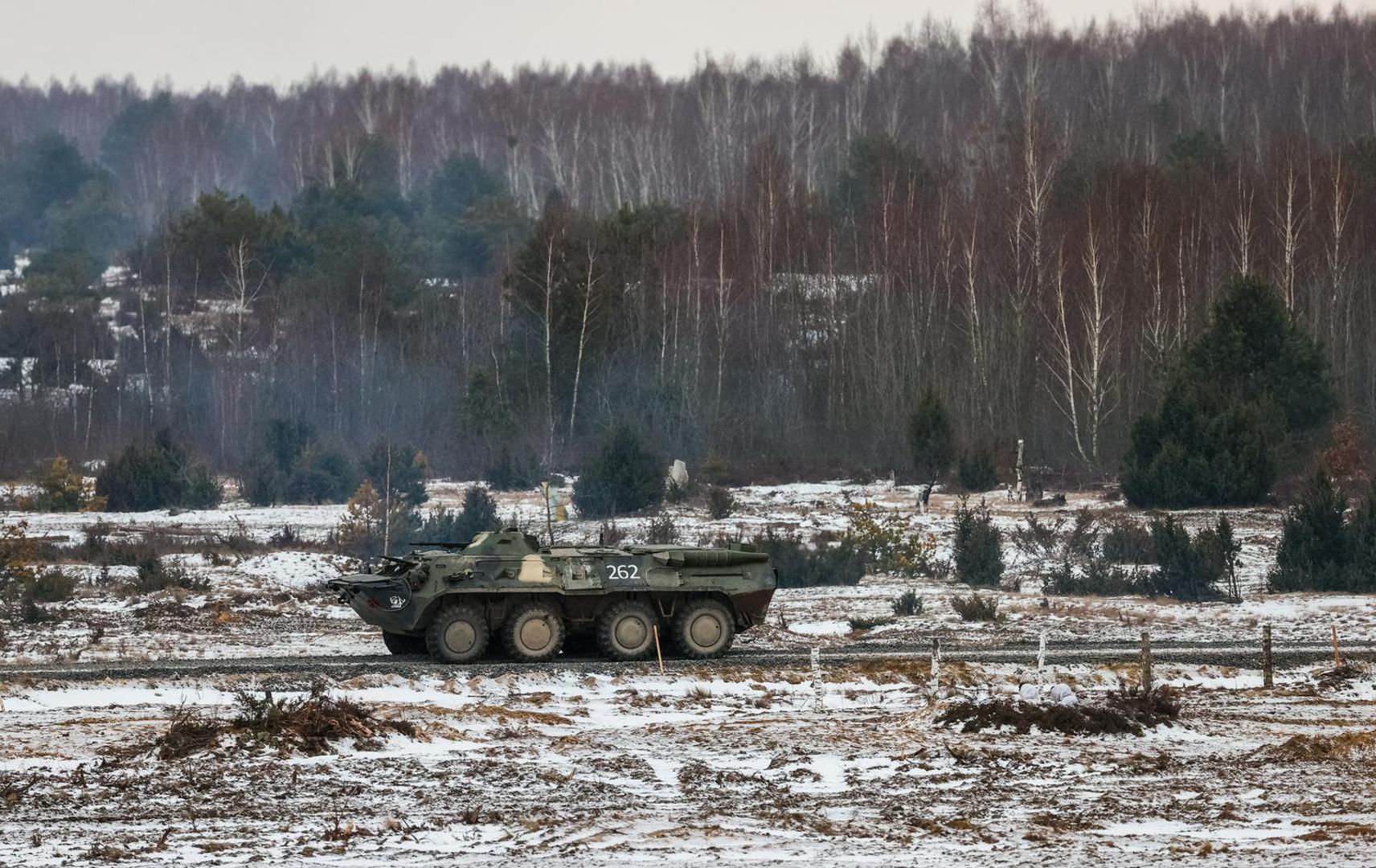 BREST REGION, BELARUS - FEBRUARY 3, 2022: A BTR-80 armored personnel carrier takes part in an exercise to test response forces of the Union State of Russia and Belarus at Brestsky firing range. Combined arms, paratrooper, artillery and air force units have completed field firing. Gavriil Grigorov/TASS Photo via Newscom Photo: Gavriil Grigorov/NEWSCOM