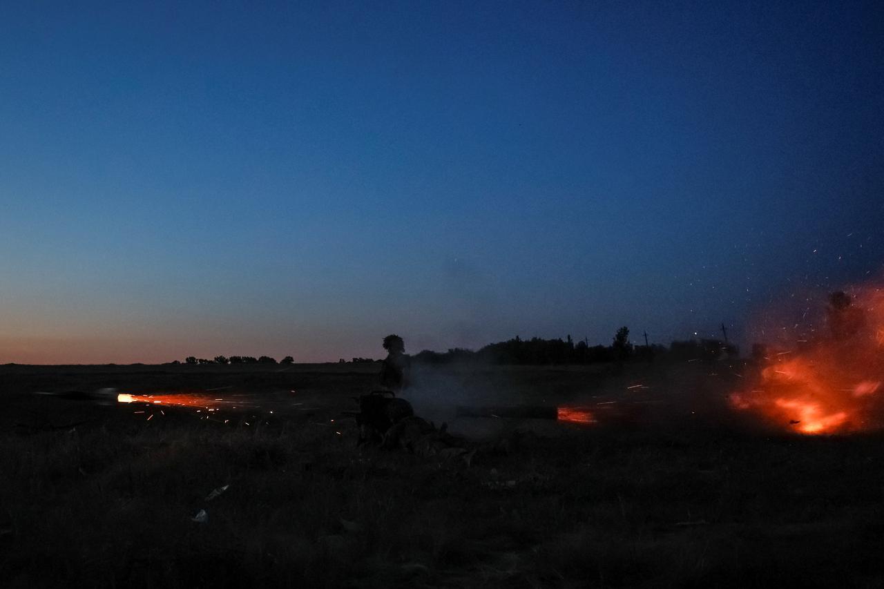 Ukrainian service members attend military drills near a frontline in Donetsk region