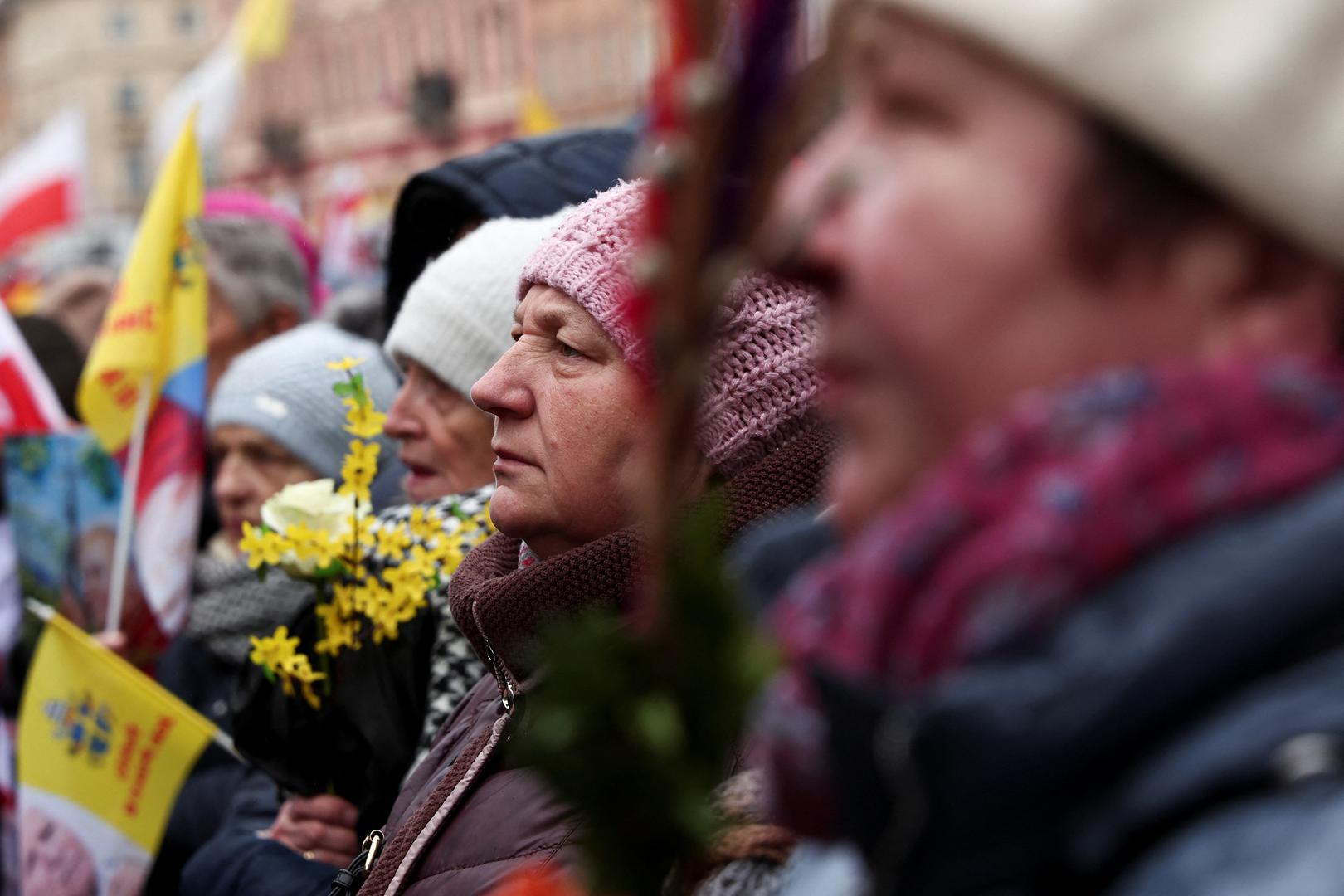 People look on as they march in defense of late Pope John Paul II on his death anniversary in Warsaw, Poland, April 2, 2023. REUTERS/Kacper Pempel Photo: KACPER PEMPEL/REUTERS