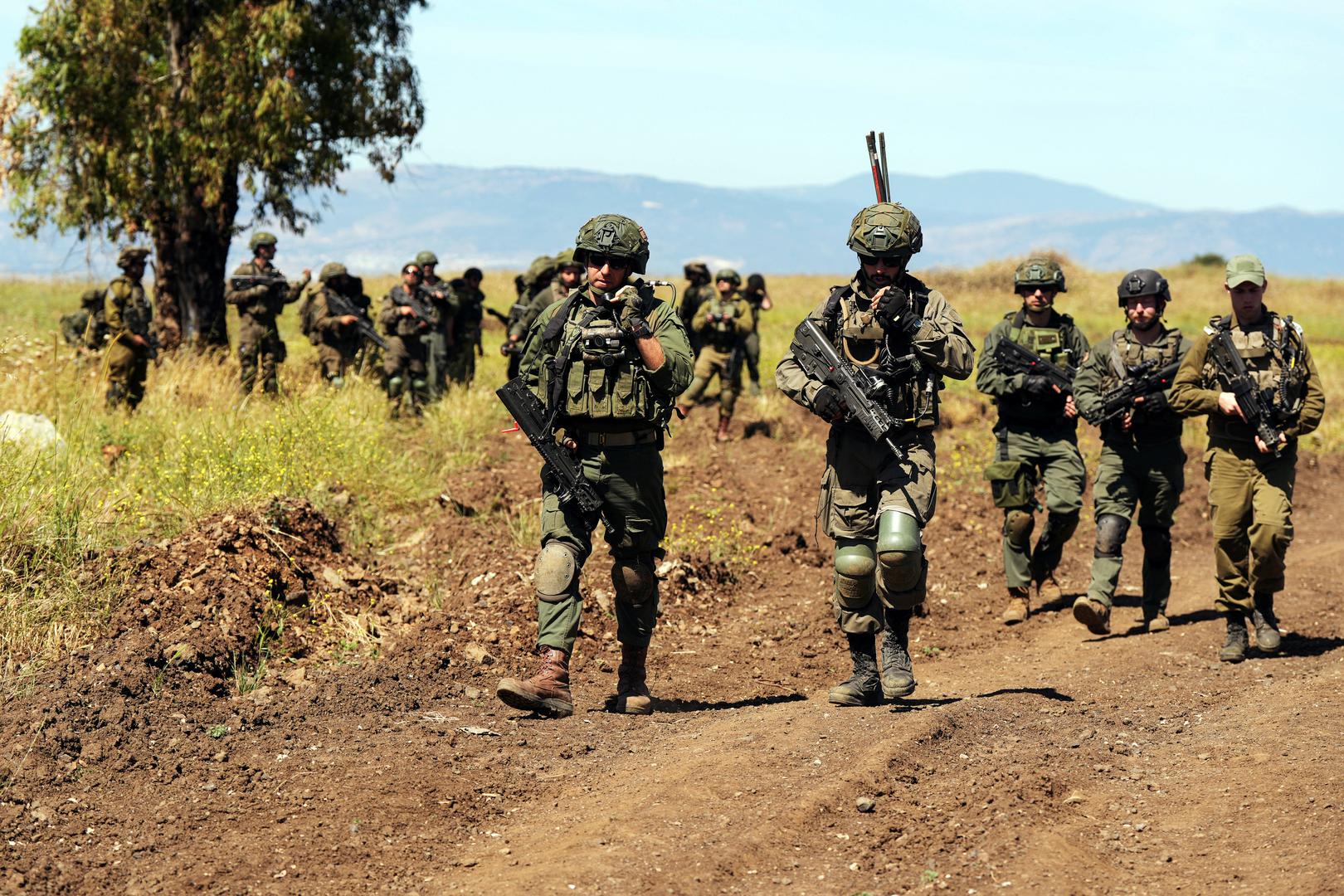 Israeli soldiers participate in a training exercise, amid the ongoing conflict in Gaza between Israel and the Palestinian Islamist group Hamas and cross-border hostilities between?Hezbollah?and Israeli forces, near Katzrin in the Israeli-occupied?Golan?Heights, May 8, 2024. REUTERS/Ayal Margolin ISRAEL OUT. NO COMMERCIAL OR EDITORIAL SALES IN ISRAEL Photo: Ayal Margolin/REUTERS