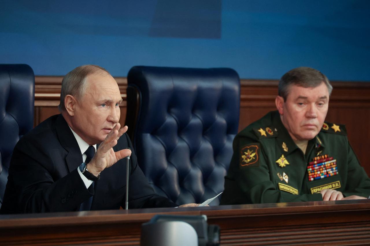 Russian President Vladimir Putin attends an expanded meeting of the Defence Ministry Board in Moscow